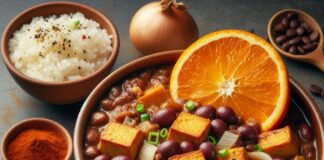 feijoada vegana, com pedaços de tofu, laranja, farofa e temperos